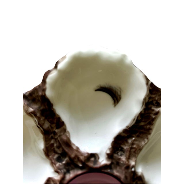 What a pretty example of an antique Limoges oyster plate to add to your collection! The interior resevoir is painted a...