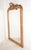 Antique French made Louis Philippe giltwood mirror. It features the rounded upper corners paired with a straight bottom...