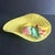 Vintage yellow basketweave trinket dish featuring relief fruit and rope design trim. Circa mid 20th c. Marked on bottom.