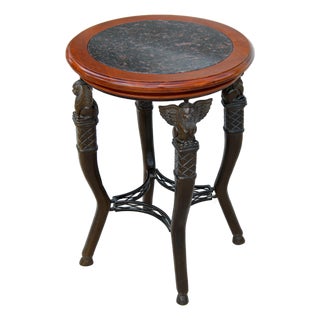 Mid-Century Egyptian Revival Style Round Stone-Top Accent Table With Sculptural Winged Griffins. For Sale
