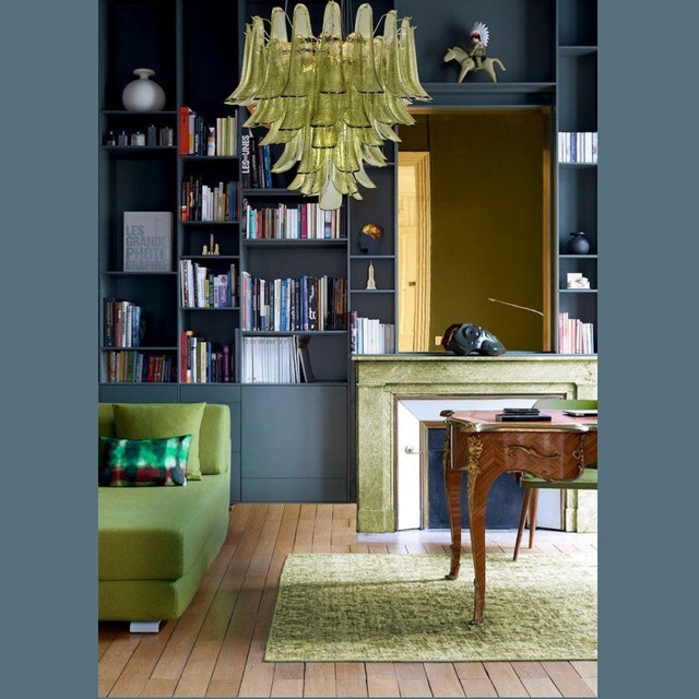 Mid century modern olive Green Murano glass chandelier, attributed to Mazzega, Italy 1980s. The Murano glass chandelier is...
