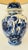 A 20th century table lamp made from a rare Delft ‘De Porceleyne Fles’ lidded vase. Decorated on an off white ground with...