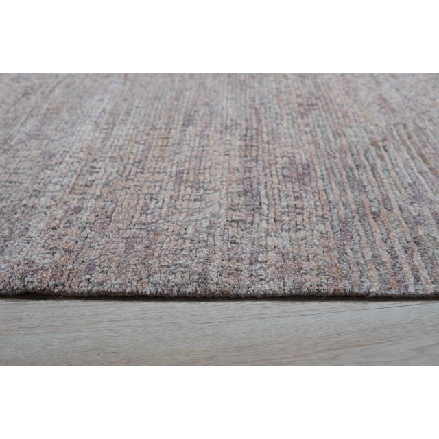 Sarrah Fiona Yellow Hand Knotted Silk Rug, Country of Origin: India. This exquisite piece defines modern luxury through...