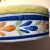 This early 20th (exact age unknown) century Quimper faience bowl or wine bottle coaster features a beautiful pattern. This...
