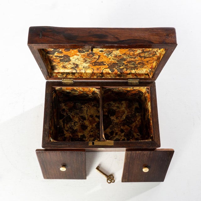 Mid 19th century rosewood tea caddy with key. Beautifully designed with multiple uses available to it. With a key it can...