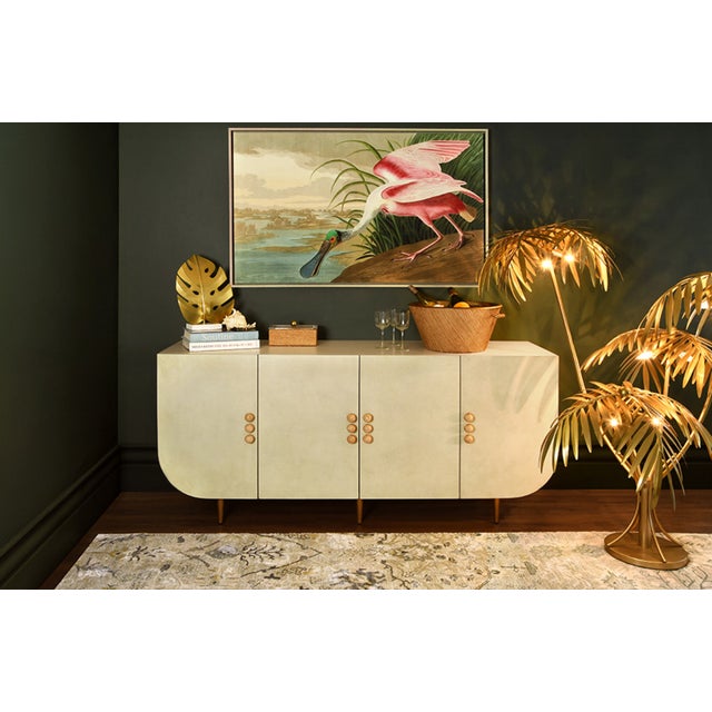 New special order item. Not vintage. Sleek storage meets style with this four-door buffet featuring charmingly rounded...