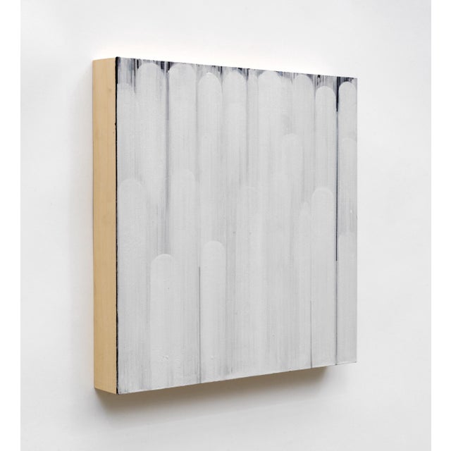 Although built on a dark gray ground, the series of paintings for White was conceived of as a process of layering white on...