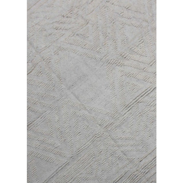 Hand knotted of top quality natural dyed wool and cotton in Afghanistan. This unique and innovative Navajo style Rug is an...