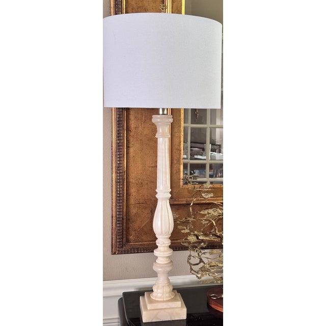 Presenting a classically formed vintage Restoration Hardware style natural stone column table lamp in warm colors of...