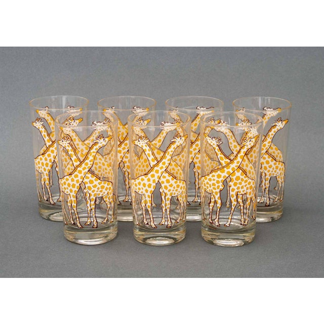 C.E. Tausch Giraffe and Monkey Glasses, each signed to lower rim, comprising: seven (7) giraffe motif highball glasses and...