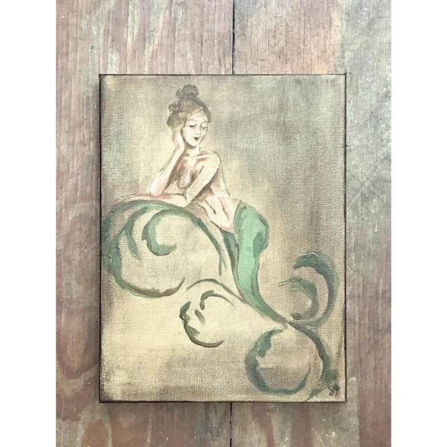 This vintage oil painting depicts a mermaid in a relaxed, reclining pose, her head resting gently against one hand as she...