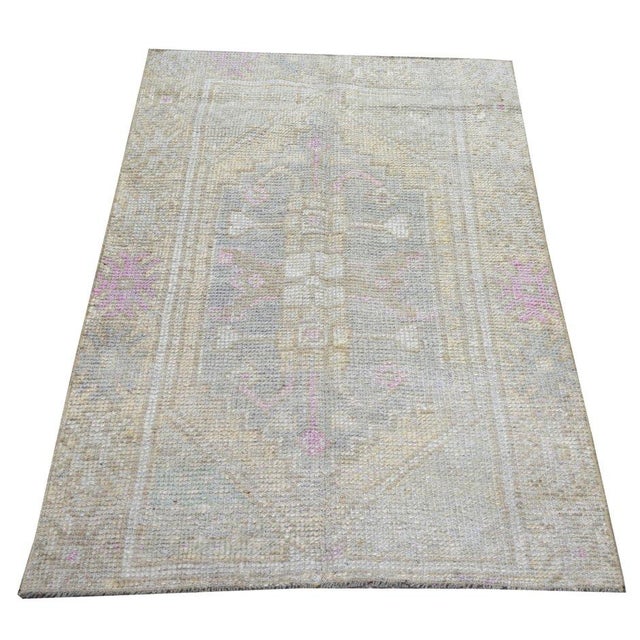 Hand-knotted with care using traditional rug-making techniques, this wool rug blends timeless craftsmanship with a modern...