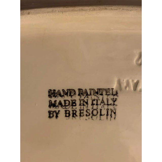 Offering an unusual porcelain covered dish from Italy. It is in the form of an eggplant and is sized well for both butter...