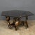 An unusual metal sculpture of a Scorpion supporting a large hexagon of smoked glass creating a striking coffee table. Of...