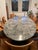Custom-designed and built 30 years ago, this one-of-a-kind solid granite dining table is a true statement piece — nothing...