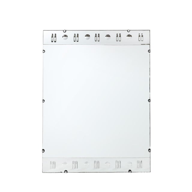 This Art Deco rectangular mirror, crafted in America circa 1935, is a stunning example of the opulent and meticulously...