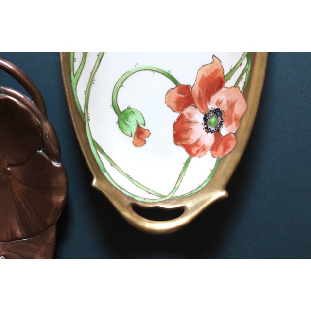 A rare bone china plate from Limoges painted with Poppies. Coronet handled dish sometimes called a "celery dish."...