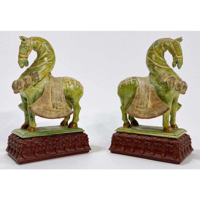 Vintage pair of Chinoiserie Tang Dynasty Asian Horse Figurines affixed to stands. Lovely as a stand-alone or use as...