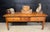 A warm and beautiful French 18th Century Console Table. Made from Cherry Wood, having 3 deep drawers to the front and 3...