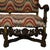 An Antique German Walnut and Upholstered Sofa features a frame crafted from rich walnut wood with intricate carvings. The...
