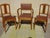 Set of two chairs and one armchair in stained beechwood. Antique Art Deco style, 1930s/1940s. Chairs with openwork wooden...