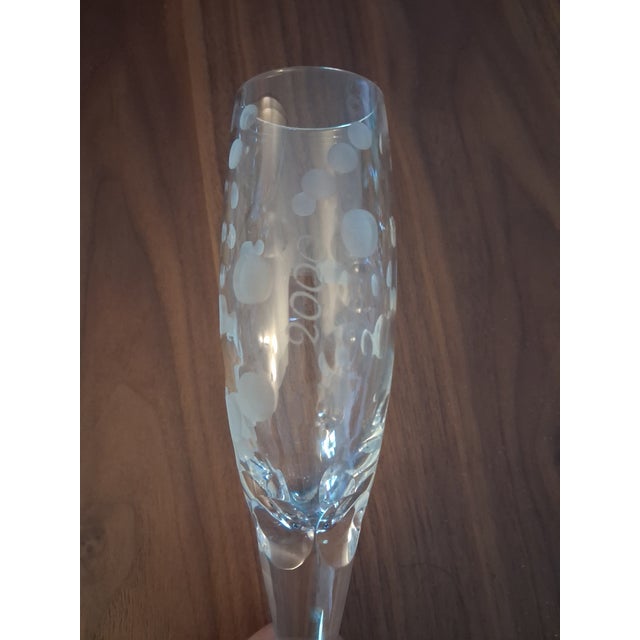 Royal Doulton Celebration Champagne Flutes featuring a white polka dot bubble design and the year 2000 for the Millennium...