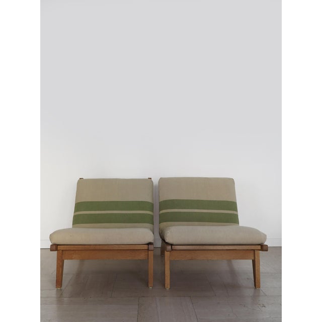 Pair of Scandinavian armchairs, model GE-370, designed by Hans J. Wegner and produced by Getama Getsted since the 1960s,...