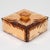 This stunning mirrored glass decorative box was crafted in the 1940s. The square design features pink peach-colored glass...