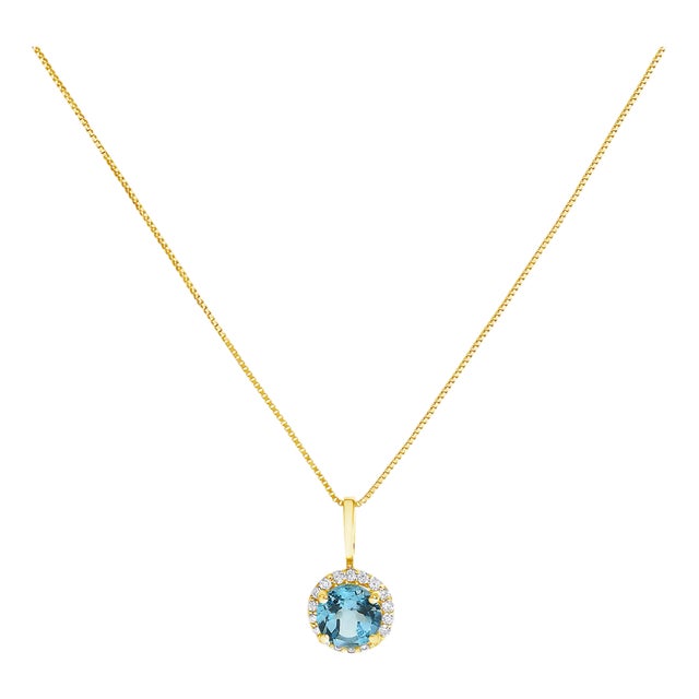 10K Yellow Gold Blue Topaz and 1/10 Cttw Diamond Accent Halo Pendant Necklace For Sale