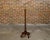 An English Turn of the Century walnut barley twist floor lamp from circa 1900 with two sockets and quadripod base. Born in...