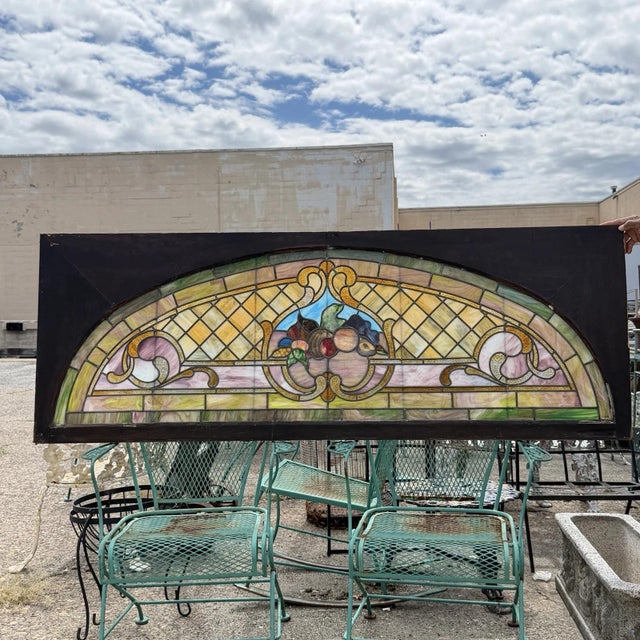 Antique Art Nouveau Multi Colored Stained Glass "Harvest Scene" Arched Transom Window in Wooden Frame (A). Listing is for...