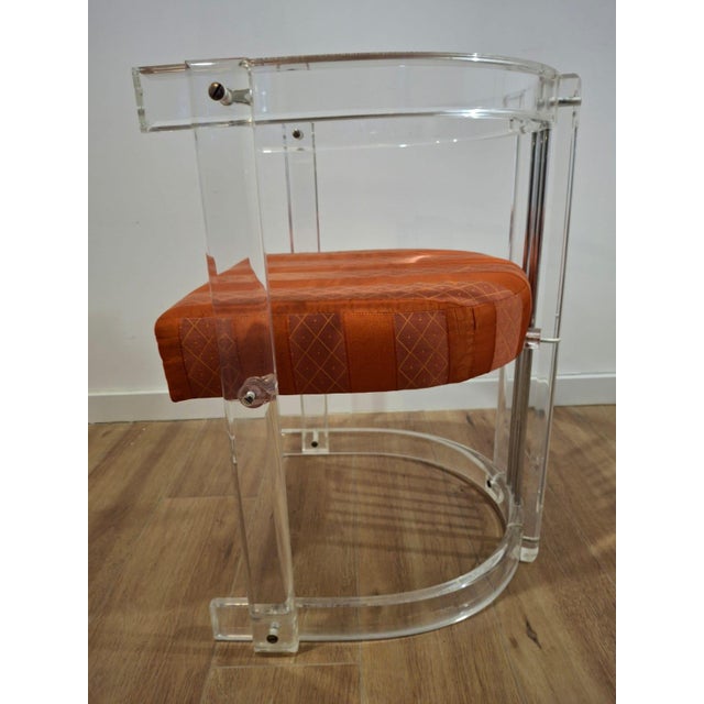 This set of 6 chairs is made of thick, transparent acrylic with chrome elements. The design reflects the spirit of Italian...