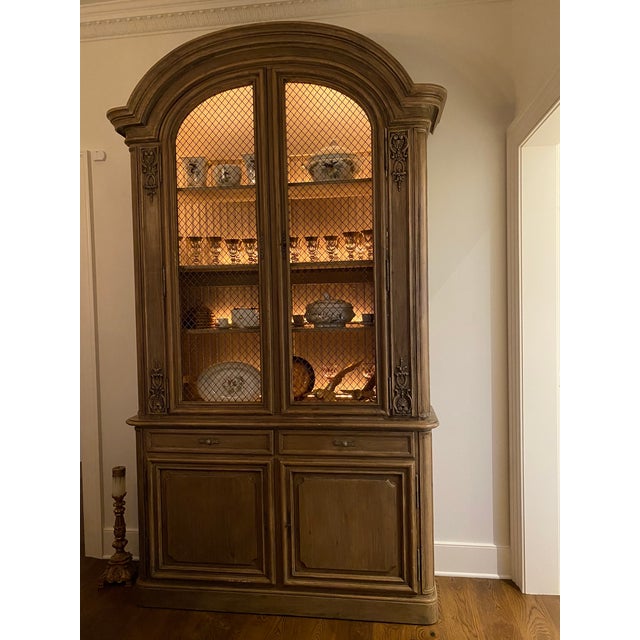 William Switzer grand scale two-piece cabinet. Timeless elegance with significant storage space, and yet has a shallow...