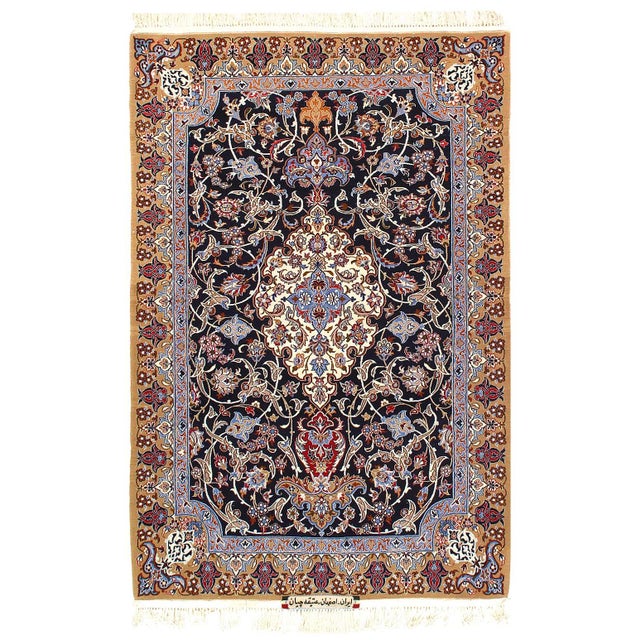 This is an authentic Persian Isfahan rug. Very fine weave, museum quality. Silk and Wool on Silk foundation,