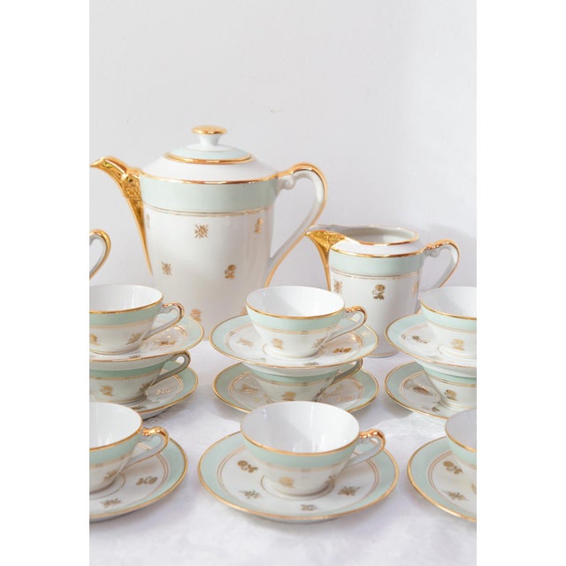 French Limoges porcelain tea or coffee set from the 1950s for 12 people, in perfect condition. The full service consists...