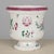 A French faience Lunéville Saint Clément cache pot, or planter. Hand-painted in typical floral design with vivid colors of...