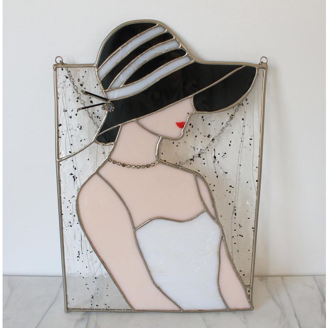 Vintage stained glass panel with female figure wearing a hat, necklace and red lipstick. No makers mark. Minor age wear....