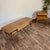 Vintage Lane Esteem coffee table and step end table set in walnut with woven cane drawer fronts, designed by André Bus and...