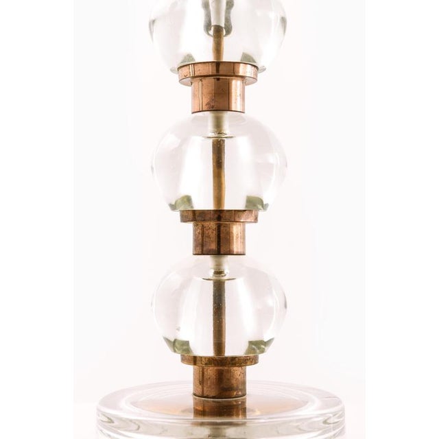 This rare pair of table lamps, produced by nybro armaturfabrik (nafa) in sweden during the 1960s, represents a...