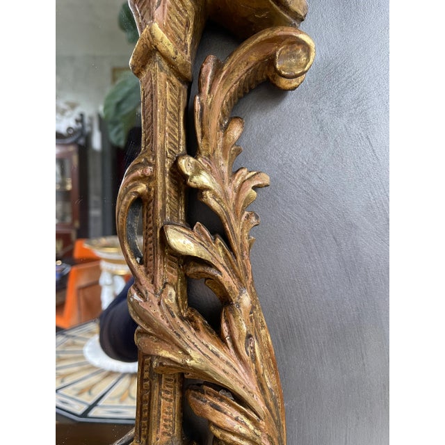 A very fine 18th Century Chinese Chippendale looking glass. The foliate design incorporates three dimensional roses...