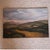 20th Century French Mountain Scene Painting depicting a sweeping, atmospheric landscape of rolling hills and distant peaks...