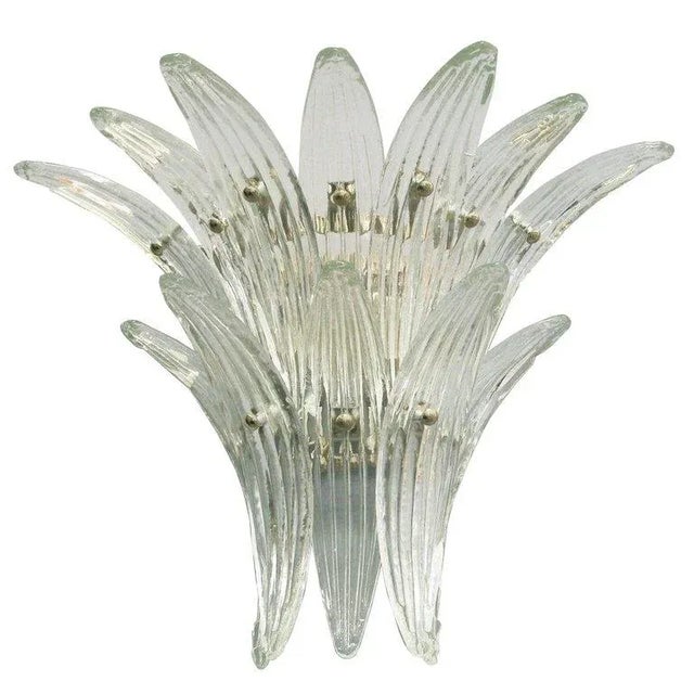 Italian Palmette wall light shown with 12 clear Murano glass leaves mounted on chrome finish metal frame by Fabio Ltd /...