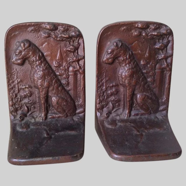 A pair of Antique Art Deco Terrier Dog Bookends. The Bookends are made of cast iron with a patinated bronze finish and...