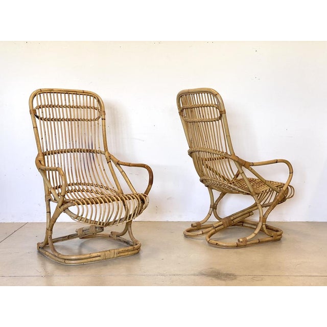 Pair of bamboo armchairs years 70s.