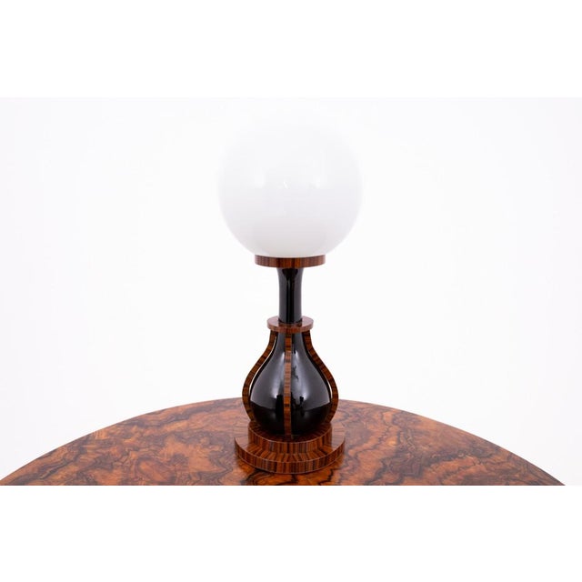 Art Deco lamps from the mid-20th century, Poland. Lamps with a beautiful base, the ceramic center is surrounded by wooden...