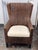 Design Plus Gallery presents a Woven Armchair from Crate & Barrel. A high back chair, gently curved arms, tapered black...