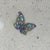 Colorful enamel, a variation of ombred blues, green, and a touch of brown and lime adorn this rare butterfly brooch....