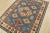 This traditional tribal geometric Caucasian Kazak rug is hand-knotted with an all-wool pile on a cotton foundation. This...