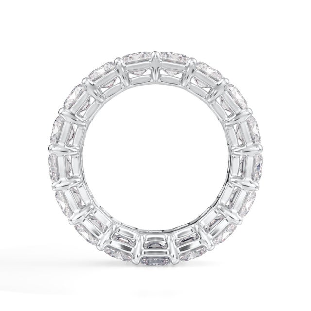 This ring has 17 GIA certified emerald cut diamonds, with each diamond weighing 0.50 carats on average, with tapered...