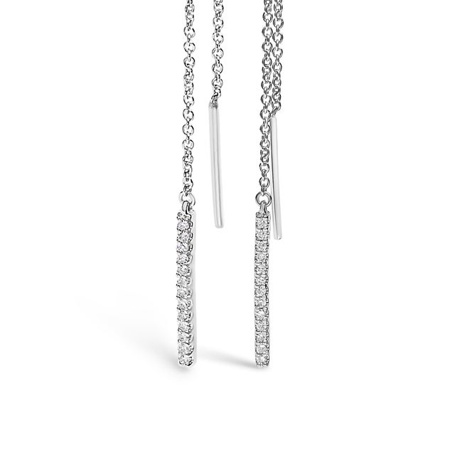 Discover the serene elegance of these 10K white gold threader earrings, where sophistication meets modern design. Each...